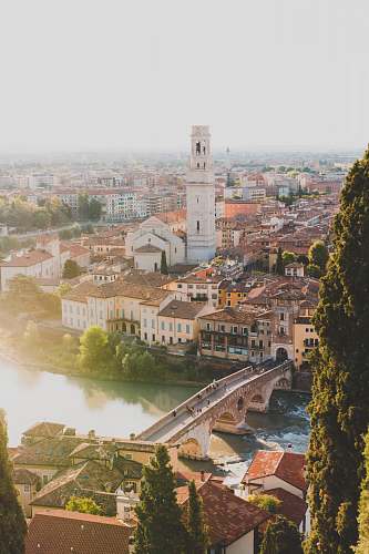aerial view brown concrete bridge near city nature